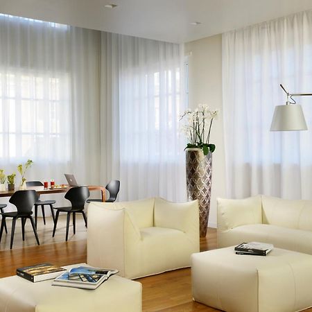 Palazzo Montemartini Rome, A Radisson Collection Hotel Esterno foto A living room