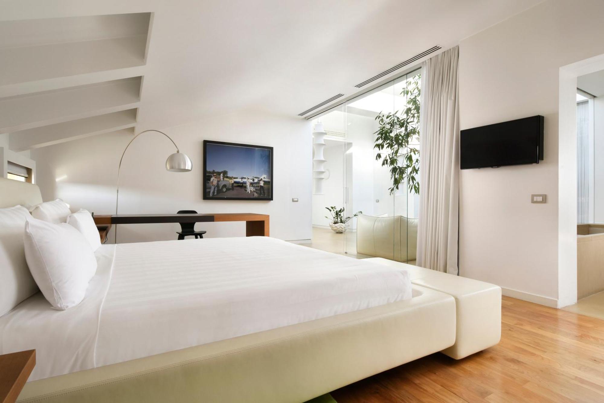 Palazzo Montemartini Rome, A Radisson Collection Hotel Esterno foto A room at the hotel