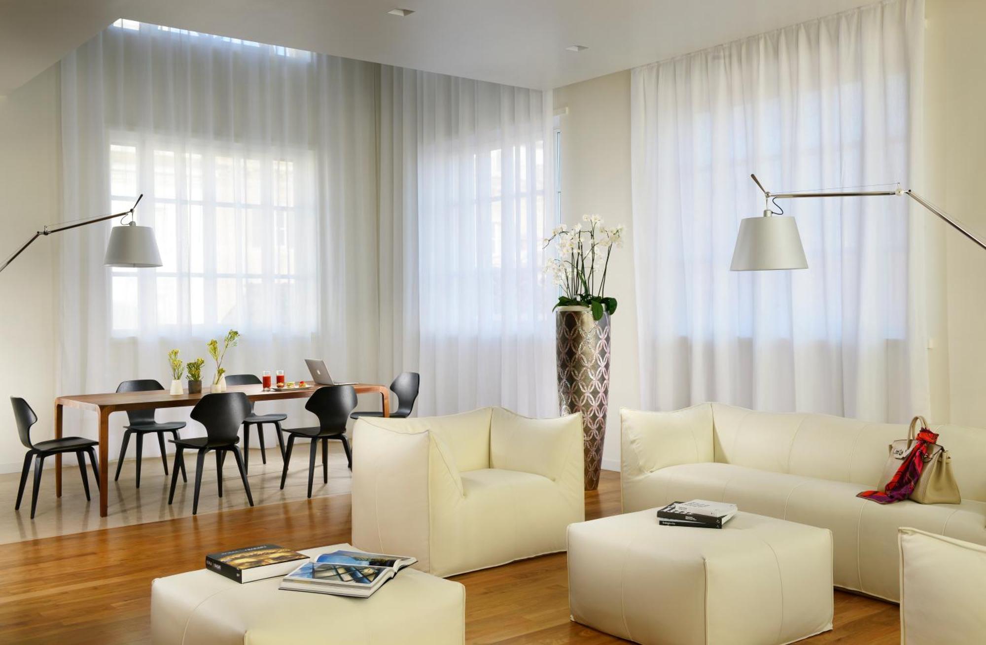 Palazzo Montemartini Rome, A Radisson Collection Hotel Esterno foto A living room