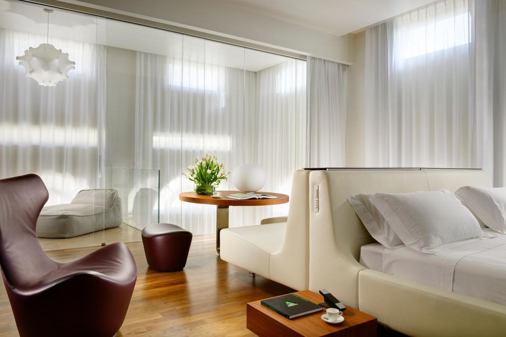 Palazzo Montemartini Rome, A Radisson Collection Hotel Esterno foto A room at the Mandarin Oriental, Munich