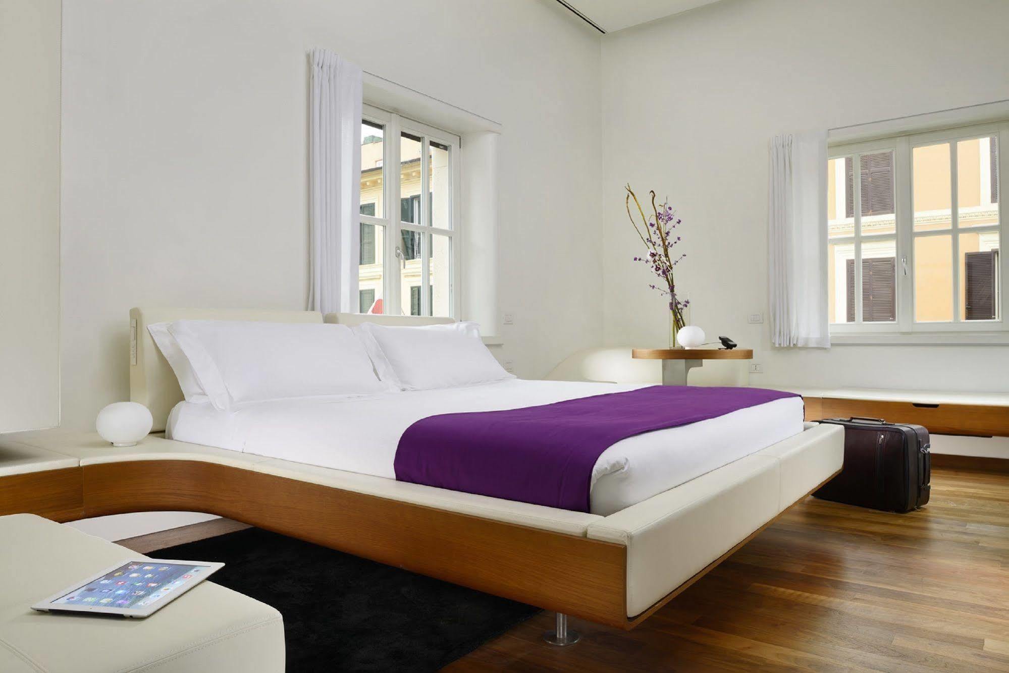 Palazzo Montemartini Rome, A Radisson Collection Hotel Esterno foto A bedroom at the Standard East Village