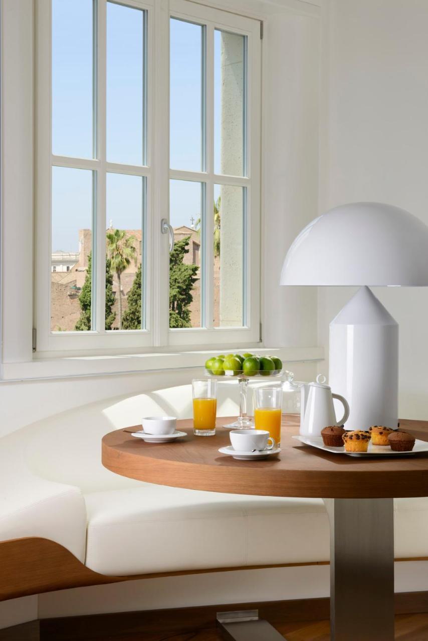 Palazzo Montemartini Rome, A Radisson Collection Hotel Esterno foto A lamp by Artemide